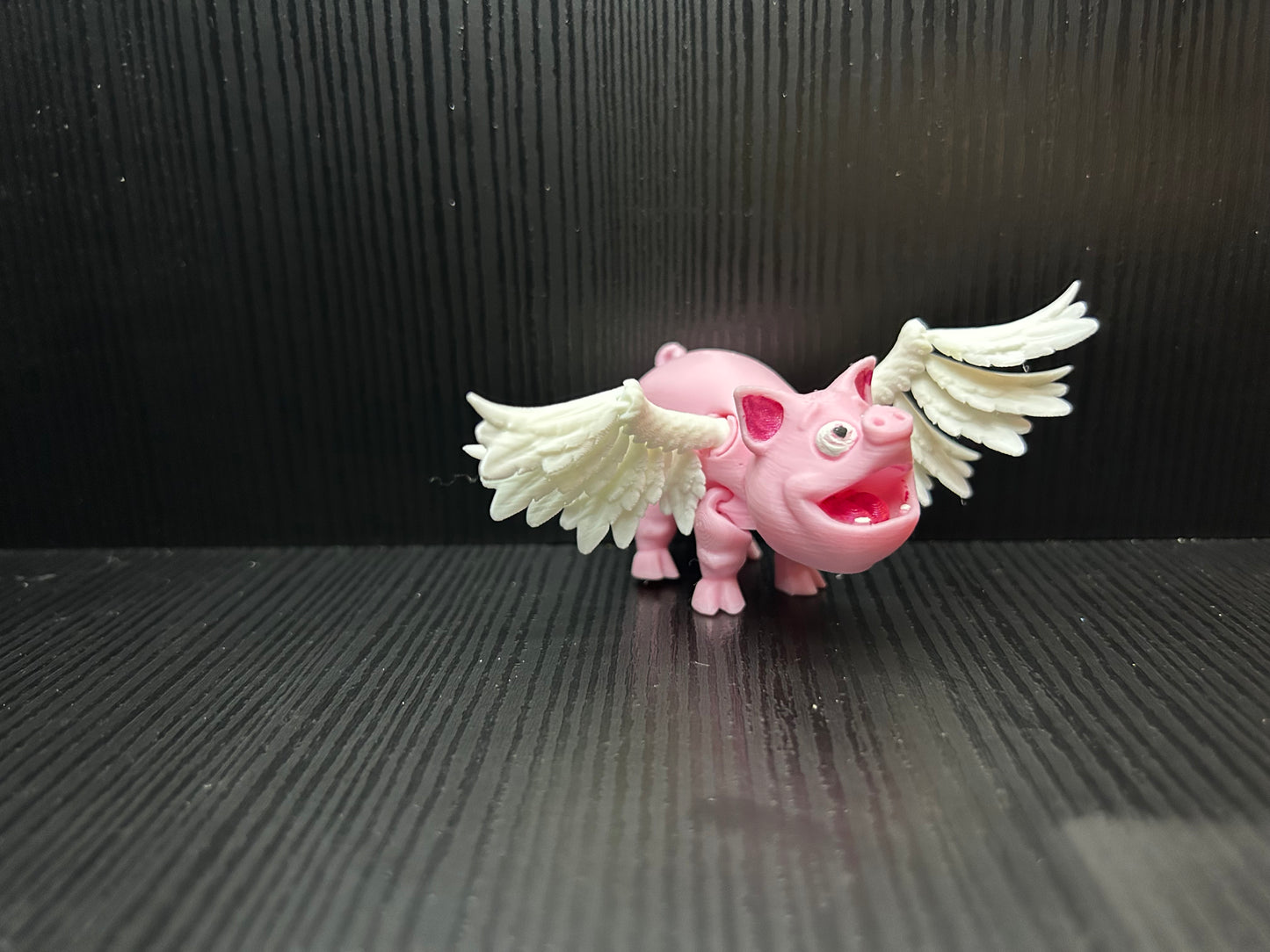 Articulated flying pig