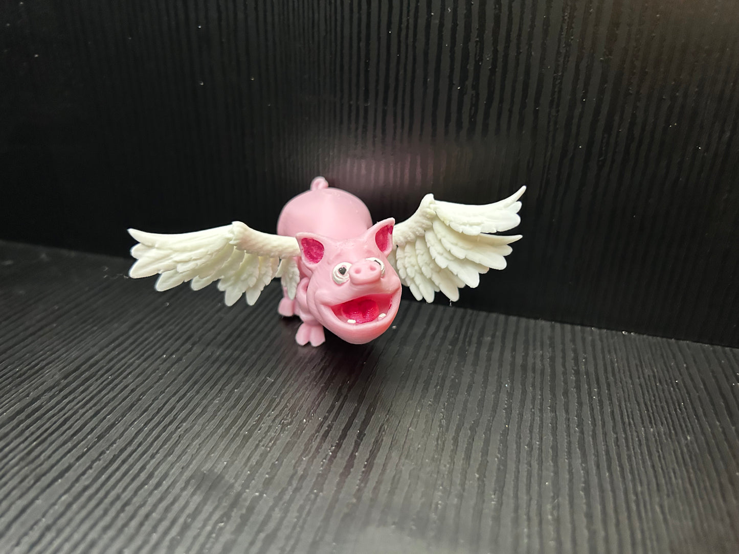 Articulated flying pig