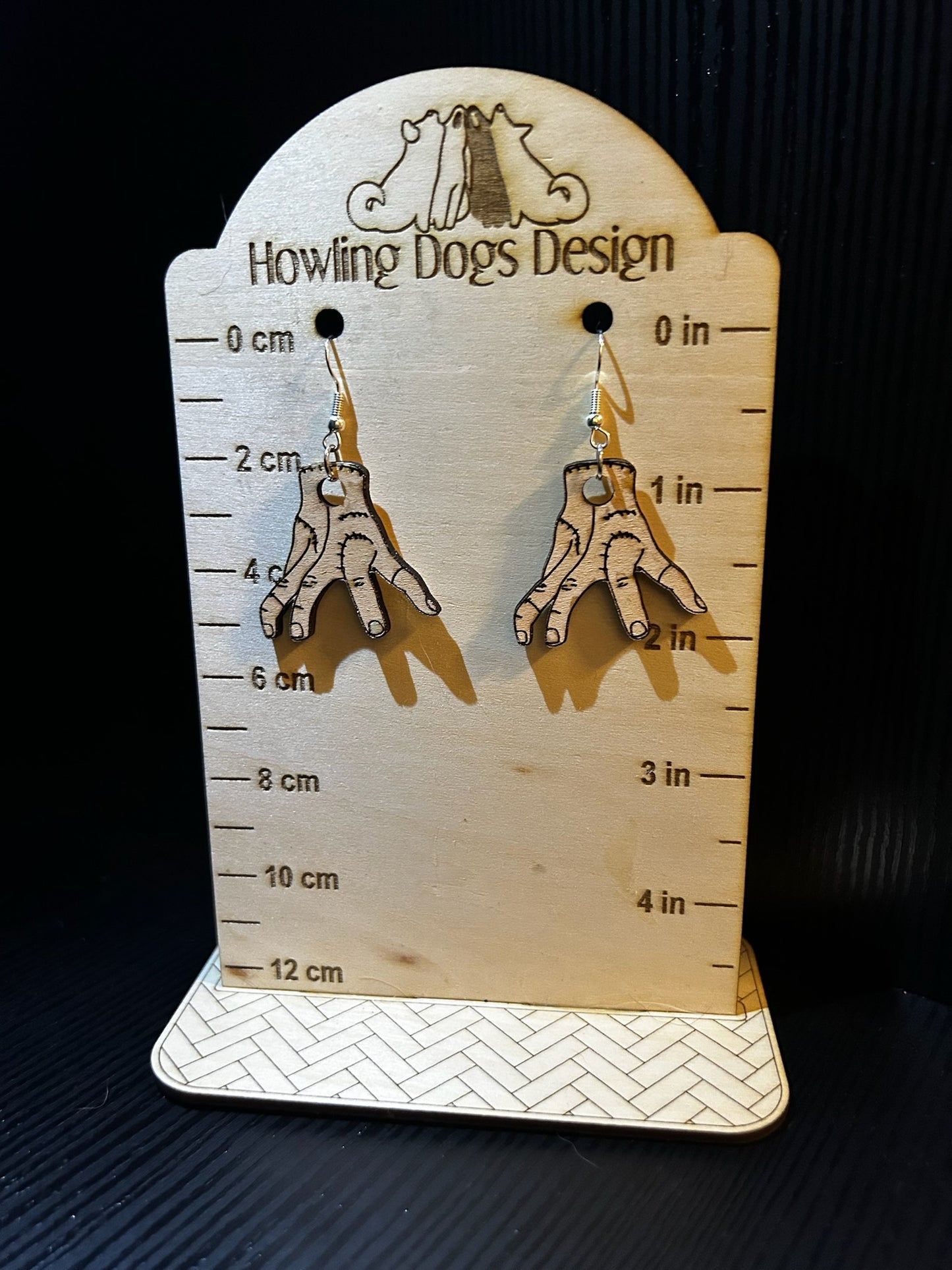 Addams Family Thing earrings