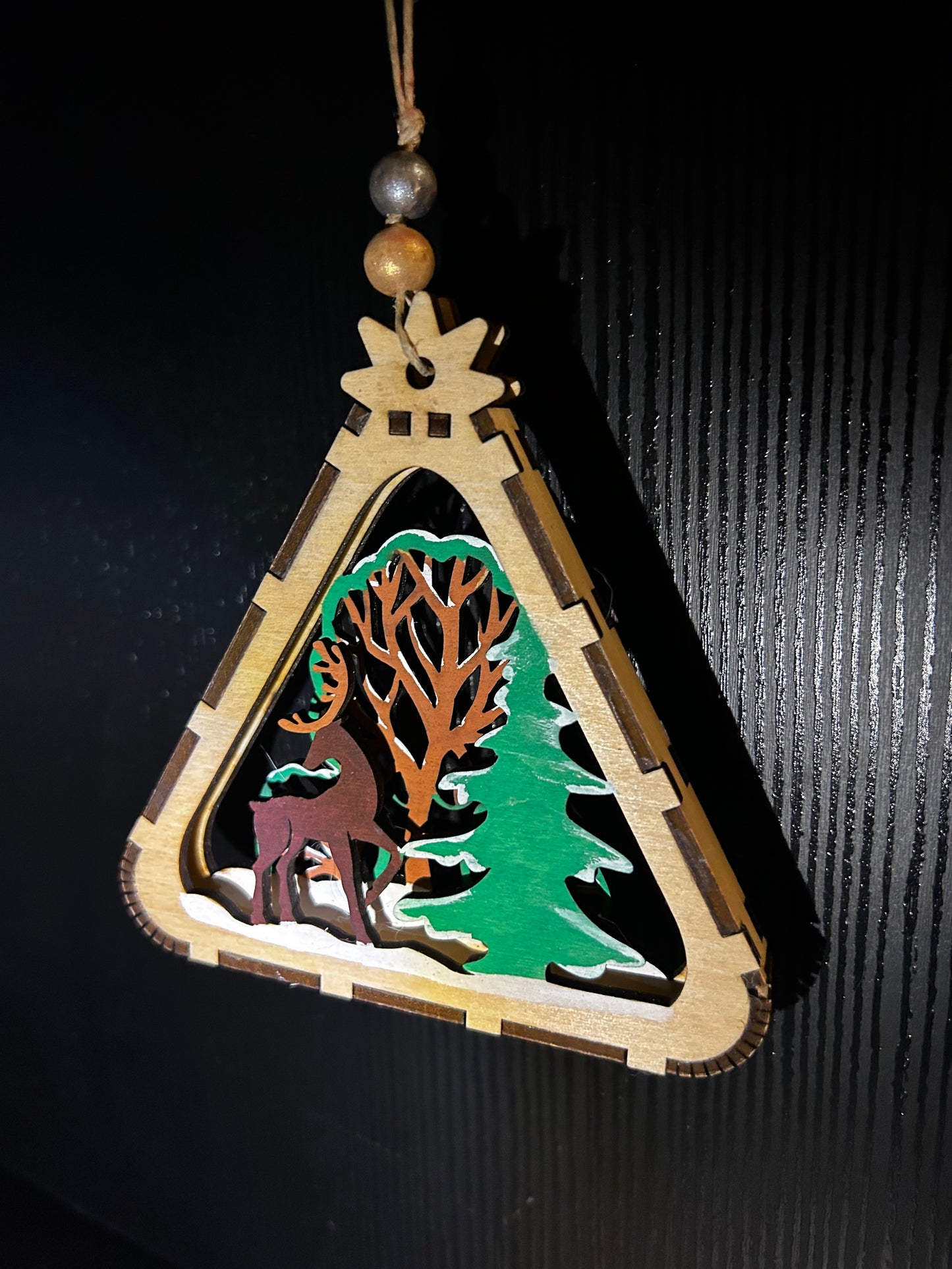 Layered deer scene ornament