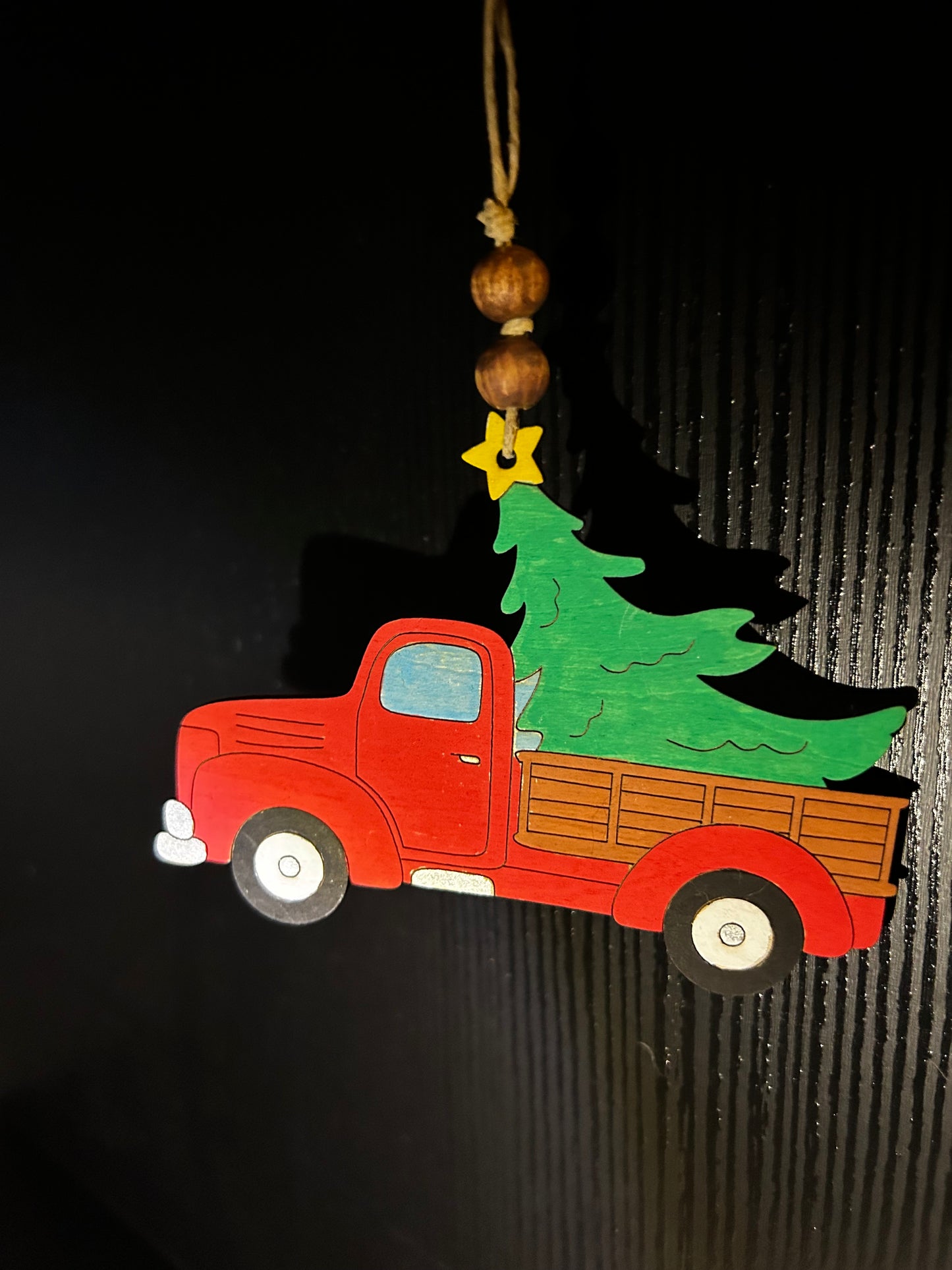 Red truck with tree ornament